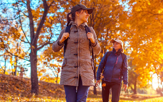 Two women walking outside