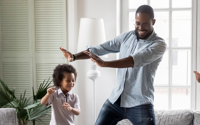 Father and son dancing